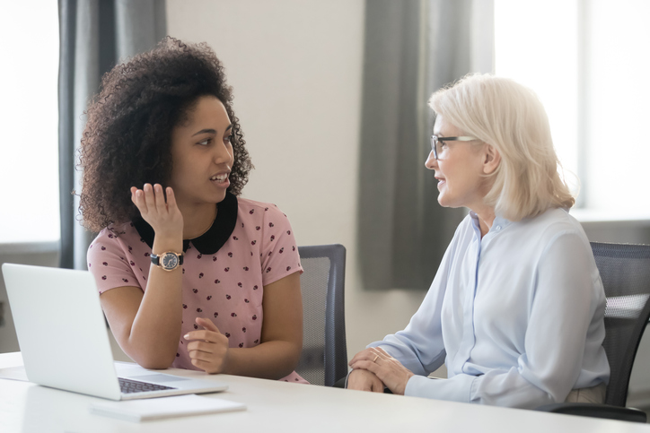 Two women having a mentoring session