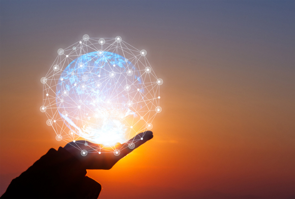 Concept of idea and innovation. Hand holding a glowing planet with lights.