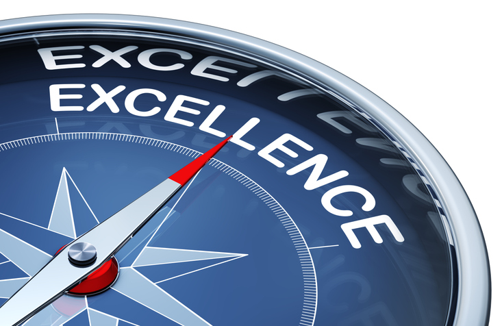 Excellence written on a compass