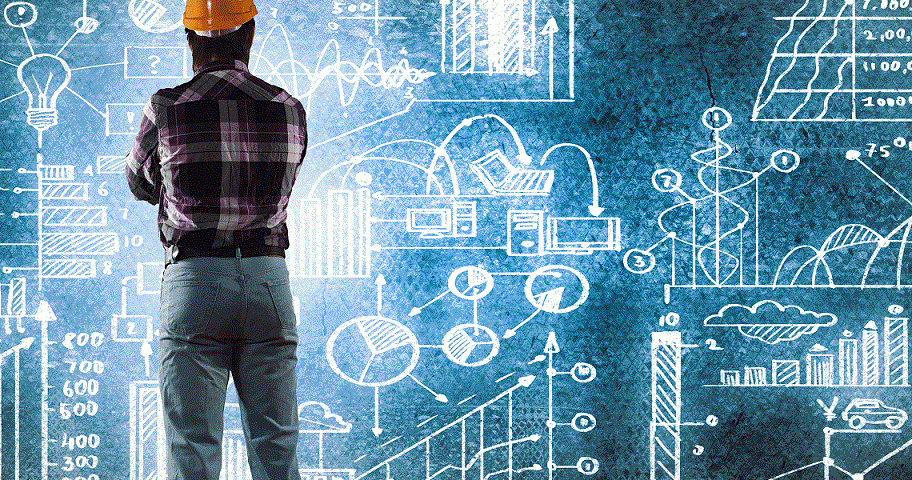 Man in hardhat observing digital plans