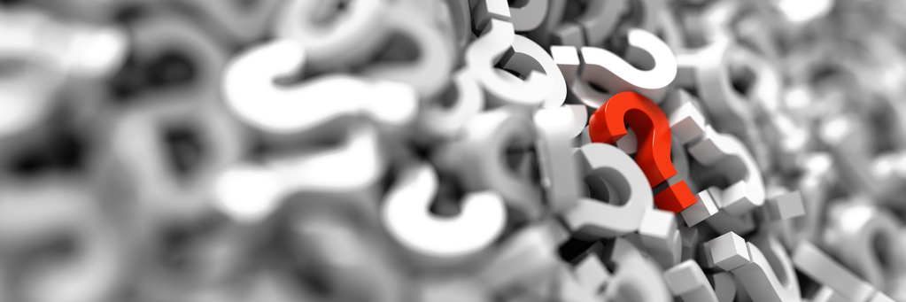 Red question mark in pile of white question marks